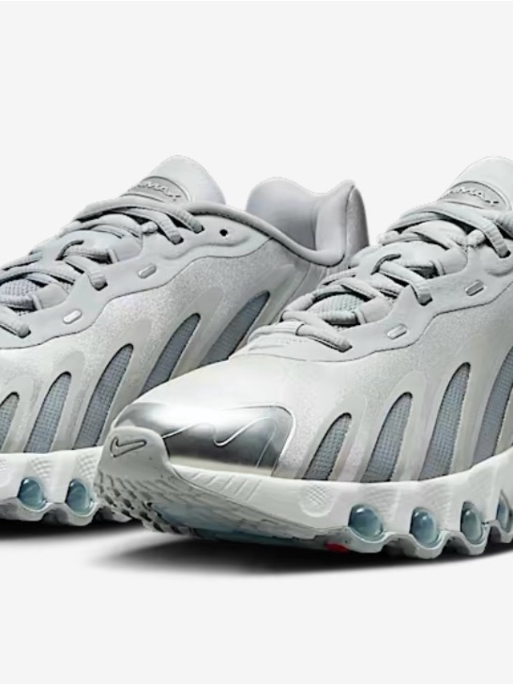 Nike Women's Light Gray Running Shoes with Silver Toe